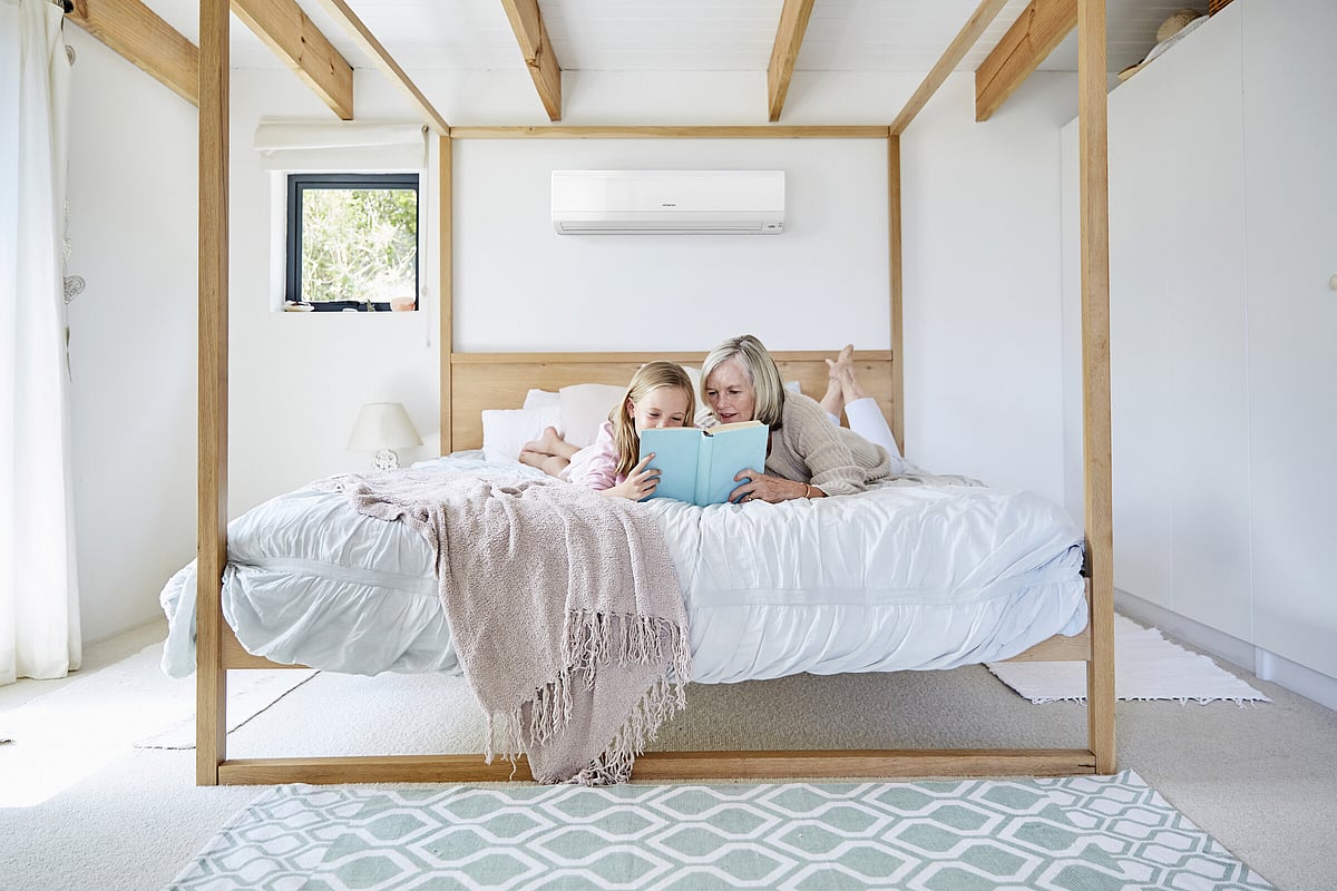 Family enjoying a comfortable Waikato home with King Cooling heat pump installation