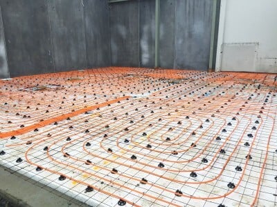 Hydronic underfloor heating pipes being installed in a Waikato new build